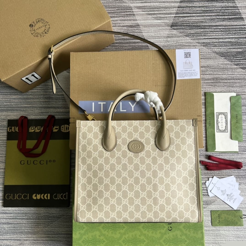 G*u*i shopping bags